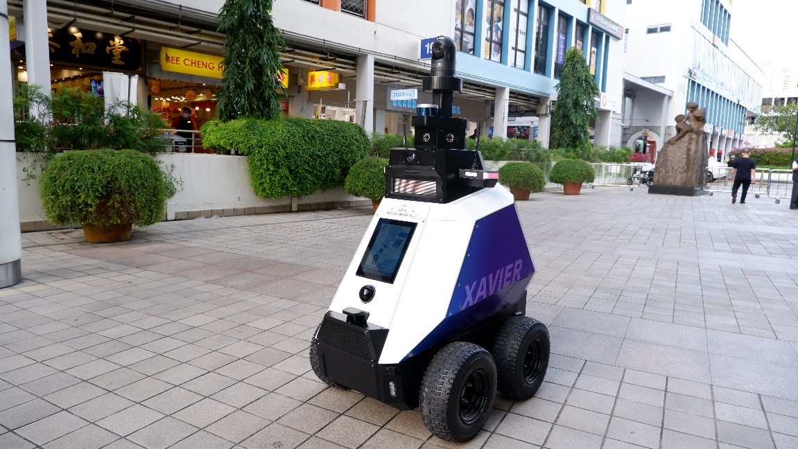 Singapore brings robotic patrols to the streets to enforce social norms